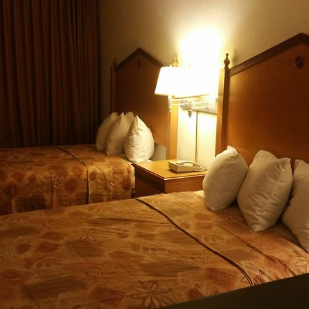 Lotus By Hotel Inn - Hot Springs Bagian luar foto